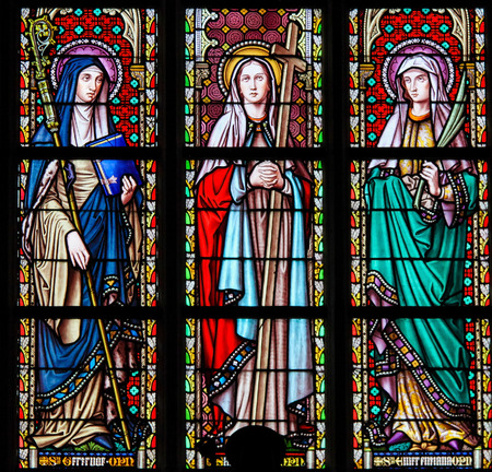 Stained Glass in the Church of Our Blessed Lady of the Sablon in Brussels, Belgium, depicting Catholic Saintsのeditorial素材