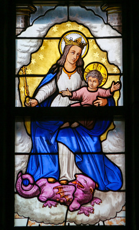 Stained Glass window in the 15th Century Elzenveld Chapel in Antwerp, Belgium, depicting Madonna and Childのeditorial素材