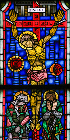 Stained Glass in Wormser Dom in Worms, Germany, depicting the Crucifixion of Jesus on Good Fridayのeditorial素材