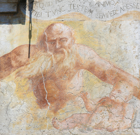 Frescoes on the Case Cazuffi-Rella, a 16th Century palazzo on the Piazza Duomo in Trento, Trentino, Italy, depicting an old bearded man and angelsのeditorial素材