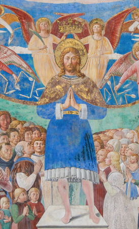 Fresco of Saint Sebastian with devotees in the Church of Sant Agostino in San Gimignano, Tuscany, Italy, created by Benozzo Gozzoli in 1464.のeditorial素材