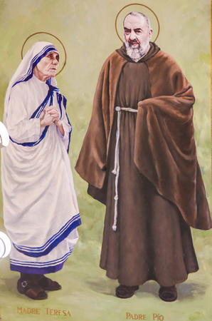 Fresco in the Church of Saint Nicholas in Valencia, Spain, of Padre Pio or Saint Pio of Pietrelcina and Mother Teresa or Saint Teresa of Calcuttaのeditorial素材