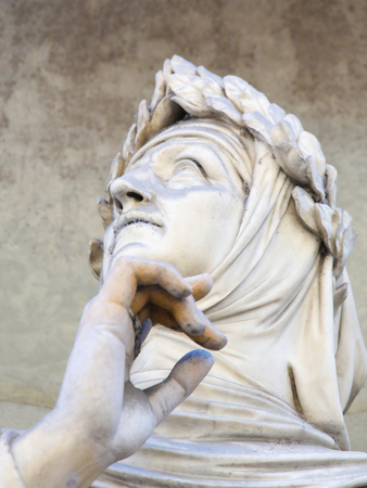 Statue of Francesco Petrarce or Petrarch in the Uffizi Colonnade in Florence, Italy. Petrarch was a famous scholar, poet and humanist.のeditorial素材