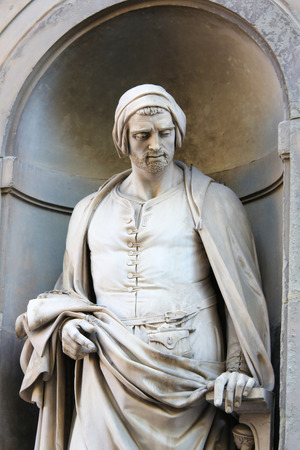 Statue of Nicola Pisano, an Italian sculptor whose work is noted for its classical Roman sculptural style, in the Uffizi Colonnade in Florence, Italy.のeditorial素材
