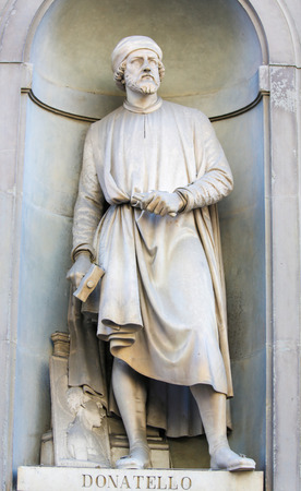 Statue of Donatello, an Italian Renaissance sculptor from Florence, in the Uffizi Colonnade in Florence, Italy.のeditorial素材