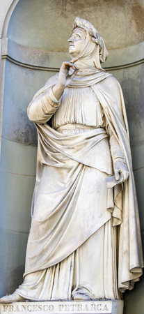 Statue of Francesco Petrarce or Petrarch in Florence, Italy. Petrarch was a famous scholar, poet and...