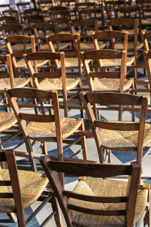 Empty Wooden Chairs in a Church in Belgiumの写真素材