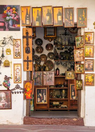 Collection of paintings at an art shop in Ronda, Andalusia, Spain.のeditorial素材