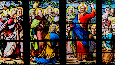 Stained Glass in the Church of Saint Severin, Latin Quarter, Paris, France, depicting Jesus handing over the Keys to the Kingdom of Heaven to Saint Peterの写真素材