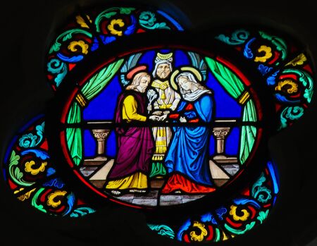 Stained Glass in the Chapel of Notre-Dame-des-flots (1857) in Sainte Adresse, Le Havre, France, depicting the Marriage of Joseph and Maryの写真素材