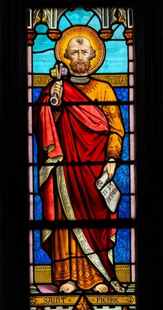 Stained Glass in the Church of St Martin in St Valery sur Somme, France, depicting Saint Peter or Petrusの写真素材