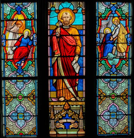Stained Glass in the Church of St Martin in St Valery sur Somme, France, depicting Saint Peter or Petrusの写真素材