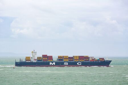 A Container Ship leaving the Port of Le Havre, Normandy, France, of MSC, Mediterranean Shipping Company, a large international shipping line.のeditorial素材