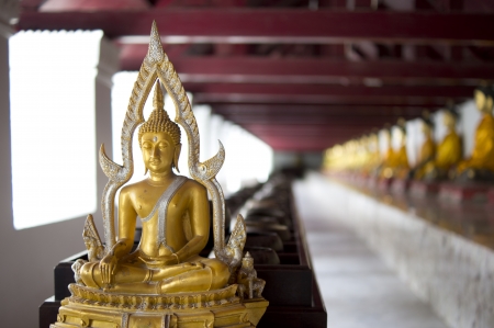 Buddha statue in front of bowl locate at Nakhorn Sri Tummarat.の写真素材