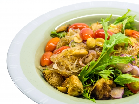Thai vermicelli with mushroom spicy mixed salad   Isolatedの写真素材