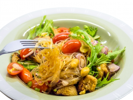 Thai vermicelli with mushroom spicy mixed salad   Isolatedの写真素材