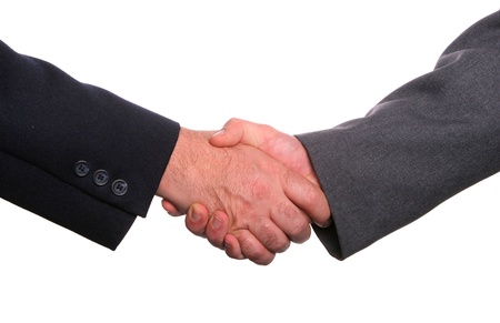 Businesspeople shaking hands, finishing up a meetingの写真素材