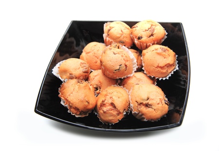 Bowl full of delicious muffins with sugar - sweet food の写真素材