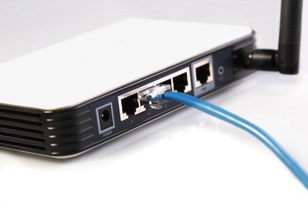 Router network hub with patch cablesの写真素材