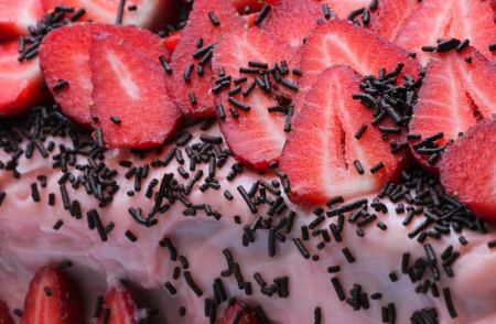 Strawberry with grated chocolate on cakeの写真素材