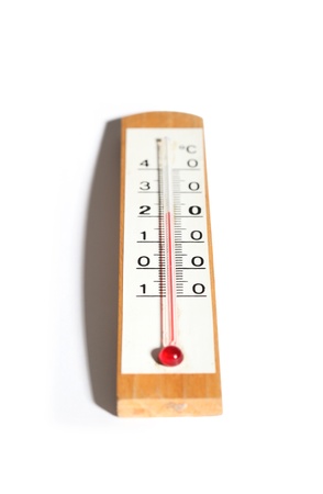 Wooden thermometer close up, weather concept white backgroundの写真素材