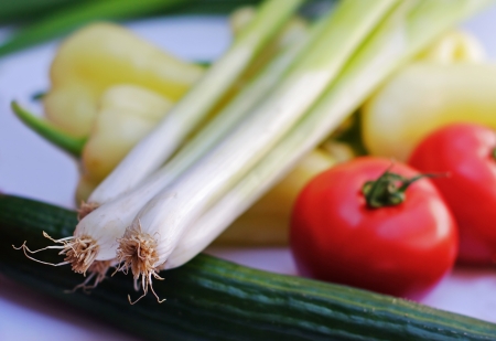 Fresh vegetables pepper, tomato, cucumber and onionの写真素材