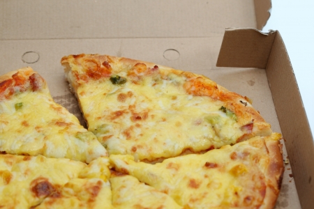 Slices of pizza in delivery boxの写真素材