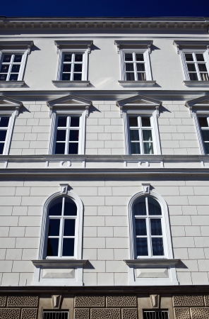 Windows on old style building facadeの写真素材
