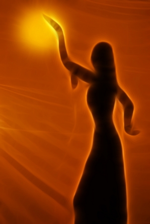 Silhouette of an oriental belly dancerの写真素材