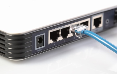 Router network hub with patch cablesの写真素材