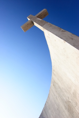Concrete crucifix with nice blue skyの写真素材