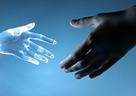 Human hand touch an atrifical glass handの写真素材
