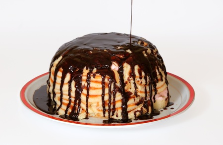 Sponge cake with chocolate and jam and almondの写真素材