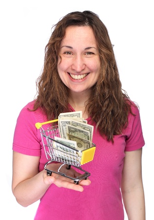 Young cheerful woman with mini shopping cartの写真素材