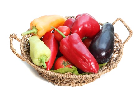 Basket full pf riped vegetables pepper, tomato and aubergineの写真素材