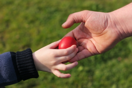 Giving an red easter egg