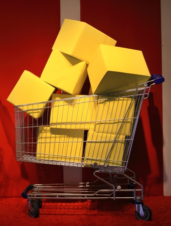 Shopping cart full with boxesの写真素材