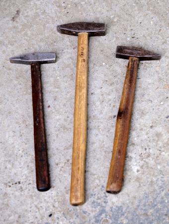 Metal sledge hammer on concrete backgroundの写真素材
