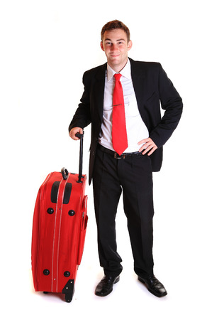 Businessman with suitcase against white backgroundの写真素材