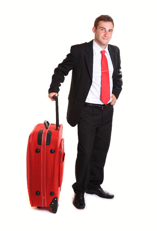Businessman with suitcase against white backgroundの写真素材