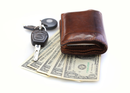 Car-key, wallet and money isolated on whiteの写真素材