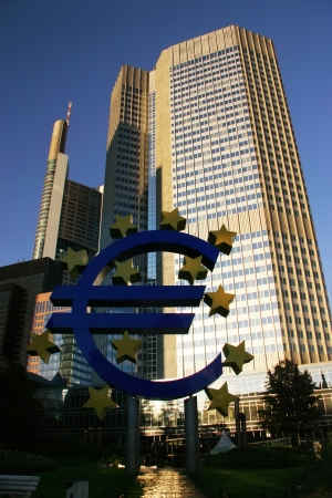 Euro symbol in Frankfurt among skyscrapersの写真素材