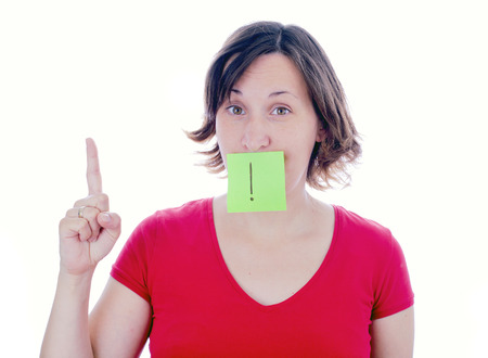 Young woman warn with finger gestureの写真素材