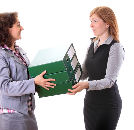 Boss give away work for her assistantの写真素材