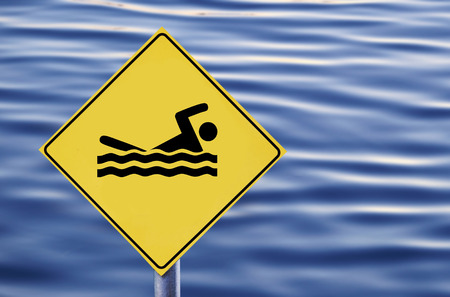 Swimming allowed in water signの写真素材