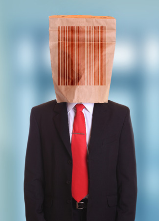 Man paper bag on head with barcode symbolの写真素材
