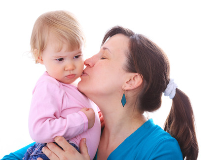 Mother with her lovely child in studioの写真素材