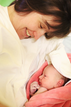 Mother with her newborn babyの写真素材