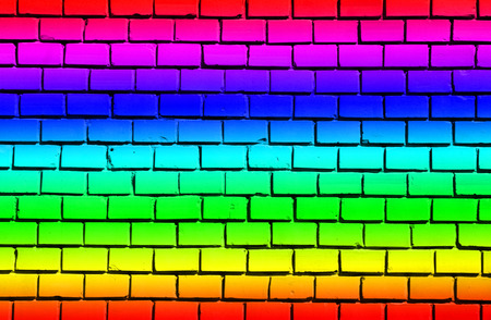 Brick wall with rainbow colors