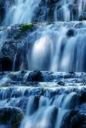 Beautiful waterfall, blue toned, long exposureの写真素材